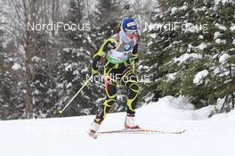 11.02.2011, Fort Kent, United States of America (USA): Marie Dorin (FRA), Rossignol, Rottefella, OneWay - IBU world cup biathlon, sprint women, Fort Kent (USA). www.nordicfocus.com. © Manzoni/NordicFocus. Every downloaded picture is fee-liable.