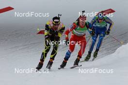 20.03.2011, Holmenkollen, Norway (NOR): Martin Fourcade (FRA), Rossignol, Rottefella, OneWay, Odlo, Michal Slesingr (CZE), Rossignol, Rottefella, Leki, Bjoern Ferry (SWE), Fischer, Rottefella, Leki, adidas - IBU world cup biathlon, mass men, Holmenkollen (NOR). www.nordicfocus.com. © Manzoni/NordicFocus. Every downloaded picture is fee-liable.
