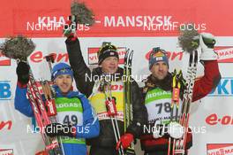 08.03.2011, Khanty-Mansiysk, Russia (RUS): (L-R): Maxim Maksimov (RUS), Madshus, Rottefella, Swix, adidas, Tarjei Boe (NOR), Fischer, Rottefella, Swix, ODLO, Christoph Sumann (AUT), Atomic, Leki  - IBU world championships biathlon, individual men, Khanty-Mansiysk (RUS). www.nordicfocus.com. © Manzoni/NordicFocus. Every downloaded picture is fee-liable.