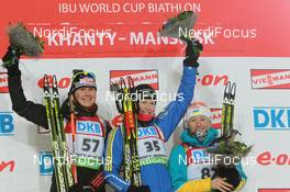 09.03.2011, Khanty-Mansiysk, Russia (RUS): (L-R): Tina Bachmann (GER), Fischer, Rottefella, Swix, adidas , Helena Ekholm (SWE), Fischer, Rottefella, Leki, adidas, Vita Semerenko (UKR), Fischer, Salomon, Swix - IBU world championships biathlon, individual women, Khanty-Mansiysk (RUS). www.nordicfocus.com. © Manzoni/NordicFocus. Every downloaded picture is fee-liable.