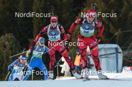 12.03.2011, Khanty-Mansiysk, Russia (RUS): Anais Bescond (FRA), Madshus, Rottefella, Swix, OneWay, Marie Laure Brunet (FRA), Rossignol, Rottefella, Swix, - IBU world championships biathlon, mass women, Khanty-Mansiysk (RUS). www.nordicfocus.com. © Manzoni/NordicFocus. Every downloaded picture is fee-liable.