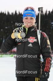 12.03.2011, Khanty-Mansiysk, Russia (RUS): Magdalena Neuner (GER), Fischer, Rottefella, Exel, adidas - IBU world championships biathlon, medals, Khanty-Mansiysk (RUS). www.nordicfocus.com. © Manzoni/NordicFocus. Every downloaded picture is fee-liable.