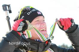 05.03.2011, Khanty-Mansiysk, Russia (RUS): Tarjei Boe (NOR), Fischer, Rottefella, Swix, ODLO - IBU world championships biathlon, medals, Khanty-Mansiysk (RUS). www.nordicfocus.com. © Manzoni/NordicFocus. Every downloaded picture is fee-liable.