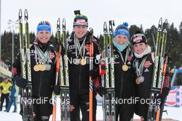 13.03.2011, Khanty-Mansiysk, Russia (RUS): (L-R): Magdalena Neuner (GER), Fischer, Rottefella, Exel, adidas, Tina Bachmann (GER), Fischer, Rottefella, Swix, adidas , Miriam Goessner (GER), Fischer, Salomon, Swix, adidas, Andrea Henkel (GER), Fischer, Rottefella, Exel, adidas, Toko - IBU world championships biathlon, medals, Khanty-Mansiysk (RUS). www.nordicfocus.com. © Manzoni/NordicFocus. Every downloaded picture is fee-liable.