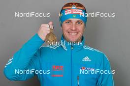 18.03.2011, Khanty-Mansiysk, Russia (RUS): Serguei Sednev (UKR), Rossignol, Rottefella, Alpina, Swix - IBU world championships biathlon, medals, Khanty-Mansiysk (RUS). www.nordicfocus.com. © Manzoni/NordicFocus. Every downloaded picture is fee-liable.