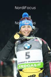 05.03.2011, Khanty-Mansiysk, Russia (RUS): Magdalena Neuner (GER), Fischer, Rottefella, Exel, adidas - IBU world championships biathlon, medals, Khanty-Mansiysk (RUS). www.nordicfocus.com. © Manzoni/NordicFocus. Every downloaded picture is fee-liable.