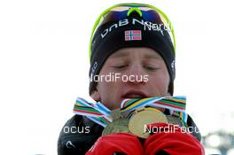 06.03.2011, Khanty-Mansiysk, Russia (RUS): Tarjei Boe (NOR), Fischer, Rottefella, Swix, ODLO - IBU world championships biathlon, medals, Khanty-Mansiysk (RUS). www.nordicfocus.com. © Manzoni/NordicFocus. Every downloaded picture is fee-liable.