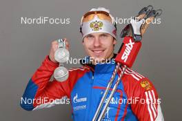 18.03.2011, Khanty-Mansiysk, Russia (RUS): Evgeny Ustyugov (RUS), Fischer, Rottefella, Swix, adidas - IBU world championships biathlon, medals, Khanty-Mansiysk (RUS). www.nordicfocus.com. © Manzoni/NordicFocus. Every downloaded picture is fee-liable.