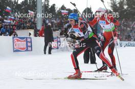 06.03.2011, Khanty-Mansiysk, Russia (RUS): Andreas Birnbacher (GER), Fischer, Rottefella, Alpina, Leki, adidas, Emil Hegle Svendsen (NOR), Madshus, Rottefella, Swix, Odlo - IBU world championships biathlon, pursuit men, Khanty-Mansiysk (RUS). www.nordicfocus.com. © Manzoni/NordicFocus. Every downloaded picture is fee-liable.