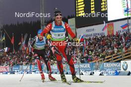 11.03.2011, Khanty-Mansiysk, Russia (RUS): Alexander Os (NOR), Fischer, Rottefella, Swix, Odlo leads Andreas Birnbacher (GER), Fischer, Rottefella, Alpina, Leki, adidas - IBU world championships biathlon, relay men, Khanty-Mansiysk (RUS). www.nordicfocus.com. © Manzoni/NordicFocus. Every downloaded picture is fee-liable.