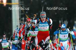 11.03.2011, Khanty-Mansiysk, Russia (RUS): Simon Eder (AUT), Fischer, Rottefella, Swix leads Christoph Stephan (GER), Fischer, Rottefella, Swix, adidas, Toko - IBU world championships biathlon, relay men, Khanty-Mansiysk (RUS). www.nordicfocus.com. © Manzoni/NordicFocus. Every downloaded picture is fee-liable.