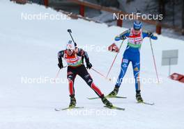 03.03.2011, Khanty-Mansiysk, Russia (RUS): Andrea Henkel (GER), Fischer, Rottefella, Exel, adidas, Toko, Helena Ekholm (SWE), Fischer, Rottefella, Leki, adidas - IBU world championships biathlon, relay mixed, Khanty-Mansiysk (RUS). www.nordicfocus.com. © Manzoni/NordicFocus. Every downloaded picture is fee-liable.
