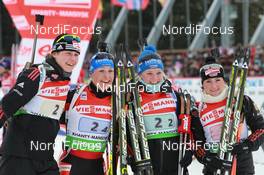 13.03.2011, Khanty-Mansiysk, Russia (RUS): (L-R): Tina Bachmann (GER), Fischer, Rottefella, Swix, adidas , Magdalena Neuner (GER), Fischer, Rottefella, Exel, adidas, Miriam Goessner (GER), Fischer, Salomon, Swix, adidas, Andrea Henkel (GER), Fischer, Rottefella, Exel, adidas, Toko - IBU world championships biathlon, relay women, Khanty-Mansiysk (RUS). www.nordicfocus.com. © Manzoni/NordicFocus. Every downloaded picture is fee-liable.