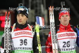 30.11.2011, Oestersund, Sweden (SWE): Martin Fourcade (FRA), Rossignol, Rottefella, OneWay, Odlo and Michal Slesingr (CZE), Rossignol, Rottefella, Leki - IBU world cup biathlon, individual men, Oestersund (SWE). www.nordicfocus.com. © Manzoni/NordicFocus. Every downloaded picture is fee-liable.