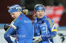 01.12.2011, Oestersund, Sweden (SWE): Jenny Jonsson (SWE), Fischer, Rottefella, Leki, adidas and Helena Ekholm (SWE), Fischer, Rottefella, Leki, adidas - IBU world cup biathlon, individual women, Oestersund (SWE). www.nordicfocus.com. © Manzoni/NordicFocus. Every downloaded picture is fee-liable.