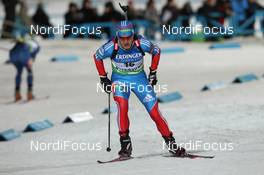 02.12.2011, Oestersund, Sweden (SWE): Evgeniy Garanichev (RUS), Madshus, Rottefella, Swix, adidas - IBU world cup biathlon, sprint men, Oestersund (SWE). www.nordicfocus.com. © Manzoni/NordicFocus. Every downloaded picture is fee-liable.