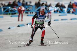 02.12.2011, Oestersund, Sweden (SWE): Jean Philippe Leguellec (CAN), Rossignol, Rottefella, Swix - IBU world cup biathlon, sprint men, Oestersund (SWE). www.nordicfocus.com. © Manzoni/NordicFocus. Every downloaded picture is fee-liable.