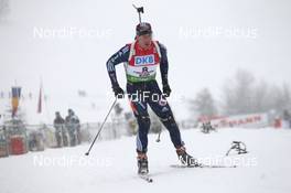 15.12.2011, Hochfilzen, Austria (AUT): Jay Hakkinen (USA), Rossignol, Rottefella, Swix, adidas - IBU world cup biathlon, sprint men, Hochfilzen (AUT). www.nordicfocus.com. © Manzoni/NordicFocus. Every downloaded picture is fee-liable.