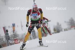15.12.2011, Hochfilzen, Austria (AUT): Arnd Peiffer (GER), Fischer, Salomon, Swix, adidas - IBU world cup biathlon, sprint men, Hochfilzen (AUT). www.nordicfocus.com. © Manzoni/NordicFocus. Every downloaded picture is fee-liable.
