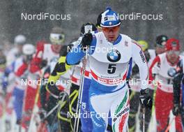 01.01.2011, Oberhof, Germany (GER): group, in front Loris Frasnelli (ITA), Salomon  - FIS world cup cross-country, tour de ski, 15km men handicap start, Oberhof (GER). www.nordicfocus.com. © Hemmersbach/NordicFocus. Every downloaded picture is fee-liable.