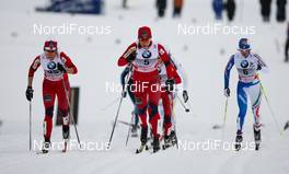 02.01.2011, Oberstdorf, Germany (GER): (l-r) Marthe Kristoffersen (NOR), Atomic, Swix, Astrid Jacobsen (NOR), Fischer, Rottefella, Swix and Marianna Longa (ITA), Fischer, Salomon, One Way  - FIS world cup cross-country, tour de ski, individual sprint, Oberstdorf (GER). www.nordicfocus.com. © Laiho/NordicFocus. Every downloaded picture is fee-liable.