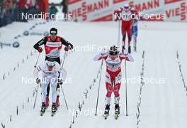 02.01.2011, Oberstdorf, Germany (GER): final sprint, l-r: Emil Joensson (SWE), Fischer, Salomon, Craft, Swix, Devon Kershaw (CAN), Fischer, Salomon, Swix, behind Dario Cologna (SUI), Fischer, Rottefella, Alpina, Swix, Odlo  - FIS world cup cross-country, tour de ski, individual sprint, Oberstdorf (GER). www.nordicfocus.com. © Hemmersbach/NordicFocus. Every downloaded picture is fee-liable.