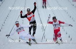 02.01.2011, Oberstdorf, Germany (GER): in the men´s final (l-r) Emil Joensson (SWE), Fischer, Salomon, Craft, Dario Cologna (SUI), Fischer, Rottefella, Alpina, Swix, ODLO, Toko and  Devon Kershaw (CAN), Fischer, Salomon, Swix - FIS world cup cross-country, tour de ski, individual sprint, Oberstdorf (GER). www.nordicfocus.com. © Laiho/NordicFocus. Every downloaded picture is fee-liable.