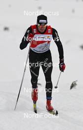 02.01.2011, Oberstdorf, Germany (GER): Dario Cologna (SUI), Fischer, Rottefella, Alpina, Swix, Odlo  - FIS world cup cross-country, tour de ski, individual sprint, Oberstdorf (GER). www.nordicfocus.com. © Hemmersbach/NordicFocus. Every downloaded picture is fee-liable.