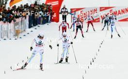 03.01.2011, Oberstdorf, Germany (GER): group, l-r: Anna Haag (SWE), Atomic, Salomon, One Way, Craft and Charlotte Kalla (SWE), Fischer, Salomon, Swix, Craft  - FIS world cup cross-country, tour de ski, pursuit women, Oberstdorf (GER). www.nordicfocus.com. © Hemmersbach/NordicFocus. Every downloaded picture is fee-liable.