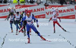 06.01.2011, Toblach, Italy (ITA): group, in front Eva Nyvltova (CZE), Madshus, Rottefella, Alpina, Swix, Leki  - FIS world cup cross-country, tour de ski, 15km women handicap start, Toblach (ITA). www.nordicfocus.com. © Hemmersbach/NordicFocus. Every downloaded picture is fee-liable.