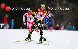 09.01.2011, Val di Fiemme, Italy (ITA):  Jean Marc Gaillard (FRA), Fischer, Swix, Rottefella, One Way ahead of Devon Kershaw (CAN), Fischer, Swix, Salomon, Halti  - FIS world cup cross-country, tour de ski, final climb men, Val di Fiemme (ITA). www.nordicfocus.com. © Laiho/NordicFocus. Every downloaded picture is fee-liable.