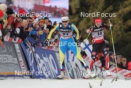 09.01.2011, Val di Fiemme, Italy (ITA): l-r: Valentina Shevchenko (UKR), Fischer, Salomon, Swix and Katrin Zeller (GER), Rossignol, Rottefella, One Way, adidas  - FIS world cup cross-country, tour de ski, final climb women, Val di Fiemme (ITA). www.nordicfocus.com. © Hemmersbach/NordicFocus. Every downloaded picture is fee-liable.