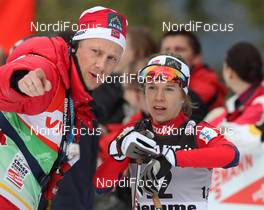 09.01.2011, Val di Fiemme, Italy (ITA): l-r: Kjell Vegard Mykland (NOR) Doctor of team Norway, Marte Elden (NOR), Fischer, Salomon, Swix  - FIS world cup cross-country, tour de ski, final climb women, Val di Fiemme (ITA). www.nordicfocus.com. © Hemmersbach/NordicFocus. Every downloaded picture is fee-liable.