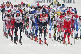 08.01.2011, Val di Fiemme, Italy (ITA): group, l-r: Curdin Perl (SUI), Rossignol, Rottefella, Swix, Odlo, Dario Cologna (SUI), Fischer, Rottefella, Alpina, Swix, Odlo, Petter Northug (NOR), Fischer, Rottefella, Alpina, Ski Go, Swix   - FIS world cup cross-country, tour de ski, mass men, Val di Fiemme (ITA). www.nordicfocus.com. © Hemmersbach/NordicFocus. Every downloaded picture is fee-liable.