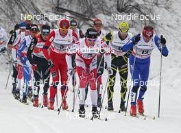 08.01.2011, Val di Fiemme, Italy (ITA): group, in front l-r: Alex Harvey (CAN), Fischer, Salomon, Swix, Lukas Bauer (CZE), Fischer, Rottefella, Alpina, Swix, Toko, behind l-r: Petter Northug (NOR), Fischer, Rottefella, Alpina, Ski Go, Swix  Jean Marc Gaillard (FRA), Fischer, Rottefella, Swix, One Way, behind l-r: Dario Cologna (SUI), Fischer, Rottefella, Alpina, Swix, Odlo  - FIS world cup cross-country, tour de ski, mass men, Val di Fiemme (ITA). www.nordicfocus.com. © Hemmersbach/NordicFocus. Every downloaded picture is fee-liable.