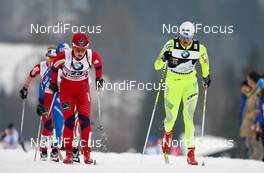 08.01.2011, Val di Fiemme, Italy (ITA): (l-r) Ingvild Flugstad Oestberg (NOR), Madshus, Swix, Alpina, Rottefella and Petra Majdic (SLO), Fischer, One Way, Alpina, Rottefella  - FIS world cup cross-country, tour de ski, mass women, Val di Fiemme (ITA). www.nordicfocus.com. © Laiho/NordicFocus. Every downloaded picture is fee-liable.