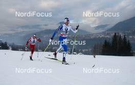 08.01.2011, Val di Fiemme, Italy (ITA): Marianna Longa (ITA), Fischer, One Way, Salomon followed by Marte Elden (NOR), Fischer, Swix  - FIS world cup cross-country, tour de ski, mass women, Val di Fiemme (ITA). www.nordicfocus.com. © Laiho/NordicFocus. Every downloaded picture is fee-liable.