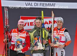 09.01.2011, Val di Fiemme, Italy (ITA): podium, l-r: 2nd Katerina Neumannova (CZE), 1st unkown (ITA), 3rd unkown (ITA) - Rampa con i Campioni, Val di Fiemme (ITA). www.nordicfocus.com. © Hemmersbach/NordicFocus. Every downloaded picture is fee-liable.