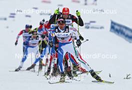 04.02.2011, Rybinsk, Russia (RUS): group, in front: Roland Clara (ITA), Fischer, Rottefella, Swix, behind Tobias Angerer (GER), Rossignol, Rottefella, One Way, adidas   - FIS world cup cross-country, pursuit men, Rybinsk (RUS). www.nordicfocus.com. © Hemmersbach/NordicFocus. Every downloaded picture is fee-liable.