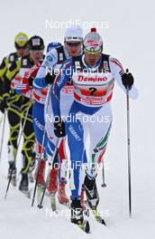 06.02.2011, Rybinsk, Russia (RUS): Group, in front Valerio Checchi (ITA), Fischer, Salomon, Swix, Rudy Project  - FIS world cup cross-country, 4x10km men, Rybinsk (RUS). www.nordicfocus.com. © Hemmersbach/NordicFocus. Every downloaded picture is fee-liable.
