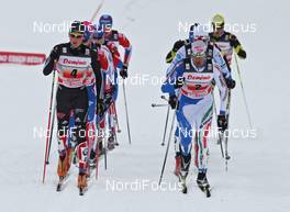 06.02.2011, Rybinsk, Russia (RUS): group, in front l-r: Andy Kuehne (GER), Rossignol, Rottefella, Leki, Adidas and Valerio Checchi (ITA), Fischer, Salomon, Swix, Rudy Project  - FIS world cup cross-country, 4x10km men, Rybinsk (RUS). www.nordicfocus.com. © Hemmersbach/NordicFocus. Every downloaded picture is fee-liable.