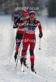 19.02.2011, Drammen, Norway (NOR): in front Astrid Uhrenholdt Jacobsen (NOR), Fischer, Rottefella, Swix behind Katrin Zeller (GER), Rossignol, Rottefella, One Way, adidas  - FIS world cup cross-country, 10km women, Drammen (NOR). www.nordicfocus.com. © Hemmersbach/NordicFocus. Every downloaded picture is fee-liable.