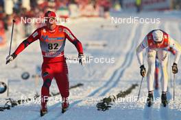 19.02.2011, Drammen, Norway (NOR): l-r: Petter Northug (NOR), Fischer, Rottefella, Alpina, Ski Go, Swix and Daniel Rickardsson (SWE), Fischer, Salomon, Swix  - FIS world cup cross-country, 15km men, Drammen (NOR). www.nordicfocus.com. © Hemmersbach/NordicFocus. Every downloaded picture is fee-liable.