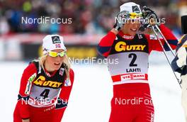12.03.2011, Lahti, Finland (FIN):  (l-r) Therese Johaug (NOR), Fischer, Swix, Salomon and Marit Bjoergen (NOR), Fischer, Swix, Rottefella - FIS world cup cross-country, pursuit women, Lahti (FIN). www.nordicfocus.com. © Laiho/NordicFocus. Every downloaded picture is fee-liable.