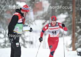 18.03.2011, Falun, Sweden (SWE): Eirik Brandsdal (NOR), Fischer, Alpina, Swix, passing his coach - FIS world cup cross-country, 3,3km men, Falun (SWE). www.nordicfocus.com. © Felgenhauer/NordicFocus. Every downloaded picture is fee-liable.