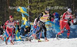 19.03.2011, Falun, Sweden (SWE): l-r: Martin Johnsrud Sundby (NOR), Fischer, Rottefella, Alpina, KV+, Dario Cologna (SUI), Fischer, Rottefella, Alpina, Swix, Odlo, Eldar Roenning (NOR), Rossignol, Rottefella, Swix - FIS world cup cross-country, pursuit men, Falun (SWE). www.nordicfocus.com. © Felgenhauer/NordicFocus. Every downloaded picture is fee-liable.