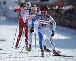 19.03.2011, Falun, Sweden (SWE): l-r: Petter Northug (NOR), Fischer, Rottefella, Alpina, Ski Go, Swix , Daniel Rickardsson (SWE), Fischer, Salomon, Swix, Giorgio di Centa (ITA), Trab, Alpina, Rottefella, Swix, Rudy Project  - FIS world cup cross-country, pursuit men, Falun (SWE). www.nordicfocus.com. © Felgenhauer/NordicFocus. Every downloaded picture is fee-liable.