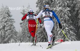28.02.2011, Oslo, Norway (NOR):  Marit Bjoergen (NOR), Fischer, Swix, Rottefella followed by Marianna Longa (ITA), Fischer, One Way, Salomon - FIS nordic world ski championships, cross-country, 10km women, Oslo (NOR). www.nordicfocus.com. © Laiho/NordicFocus. Every downloaded picture is fee-liable.