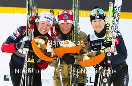 28.02.2011, Oslo, Norway (NOR):  (l-r) Justyna Kowalczyk (POL), Fischer, Swix, Salomon, Marit Bjoergen (NOR), Fischer, Swix, Rottefella and Aino-Kaisa Saarinen (FIN), Rossignol, One Way, Alpina, Rottefelle, Craft - FIS nordic world ski championships, cross-country, 10km women, Oslo (NOR). www.nordicfocus.com. © Laiho/NordicFocus. Every downloaded picture is fee-liable.