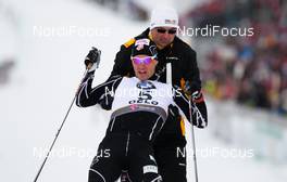 24.02.2011, Oslo, Norway (NOR): Kris Freeman (USA), Fischer, Swix, Alpina, Rottefella, needed help to get up  - FIS nordic world ski championships, cross-country, individual sprint, Oslo (NOR). www.nordicfocus.com. © Laiho/NordicFocus. Every downloaded picture is fee-liable.
